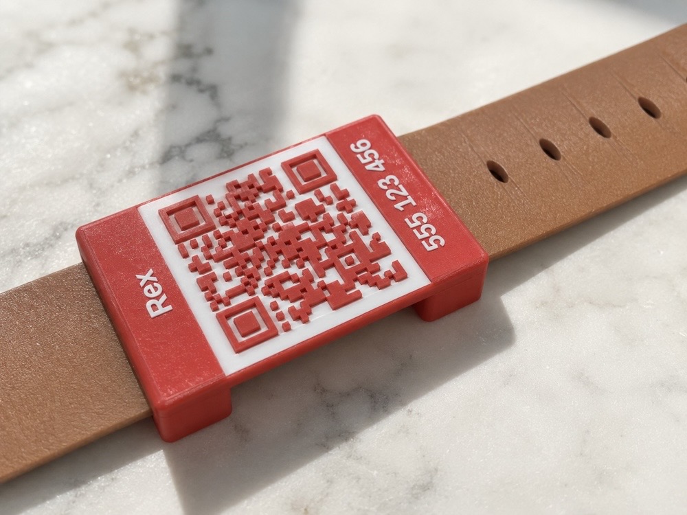 3D-printed QR pet tag on a leather dog collar